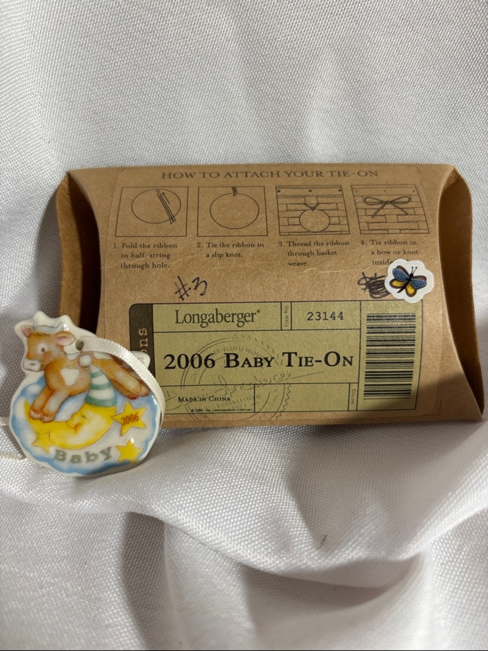 Longaberger 2006 Baby Tie-On Ornament in Blue, Yellow, Cream, Brown